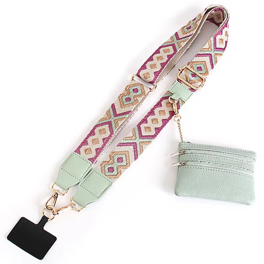 Mint green bag with a patterned strap on a white background