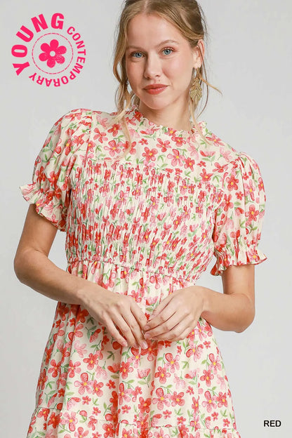 Woman wearing a floral dress with 'Young Contemporary' branding on a light gray background