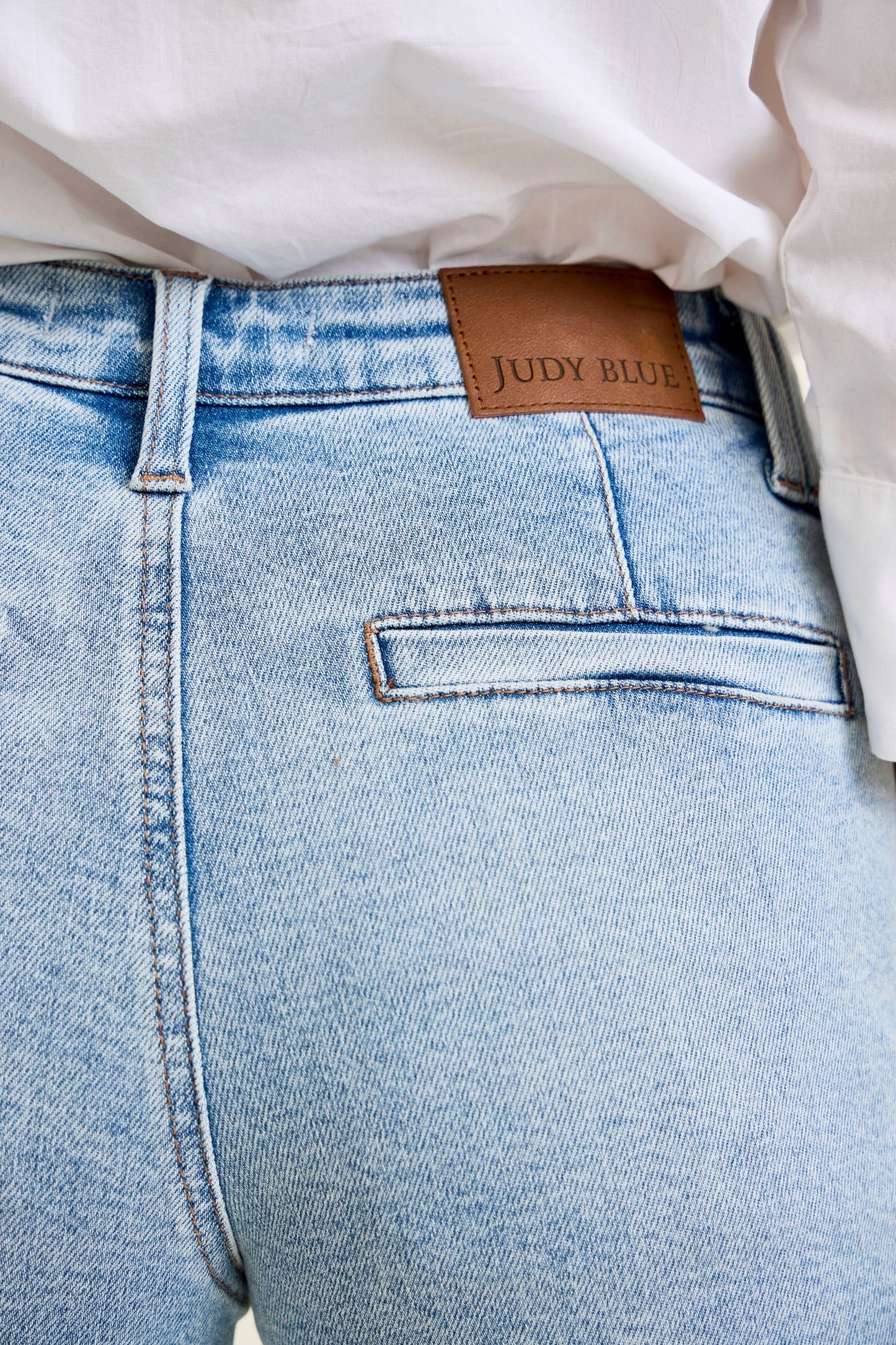 Light blue jeans with a Judy Blue label on a white background